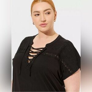 Torrid Heritage Knit black floral embroidered lace up front blouse size 3X Q27